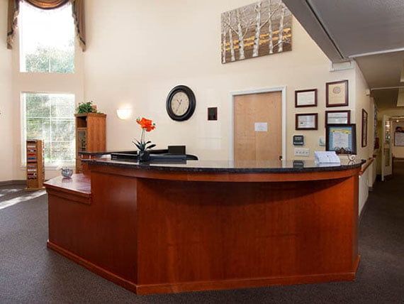 A welcoming reception desk in a modern office lobby