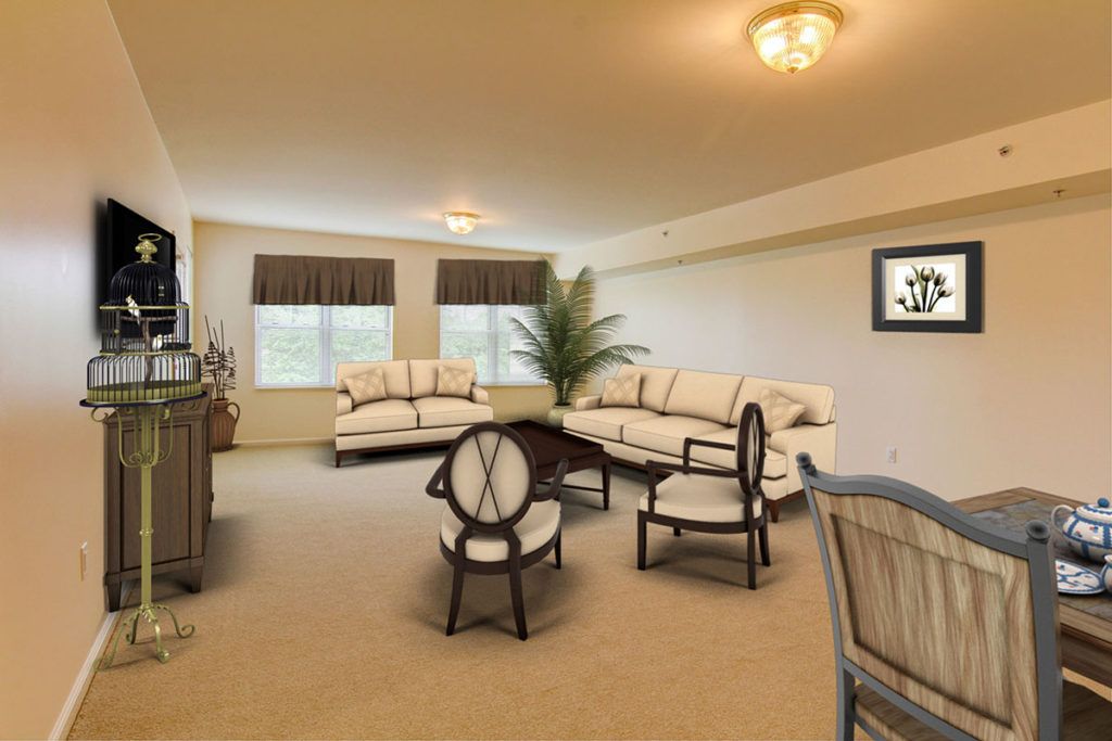 A spacious living room with comfortable seating and elegant decor.