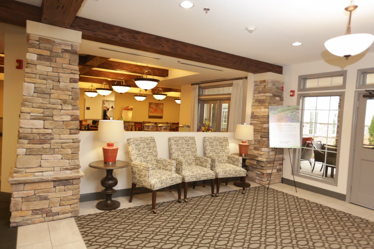 A welcoming lobby with comfortable seating and warm lighting.