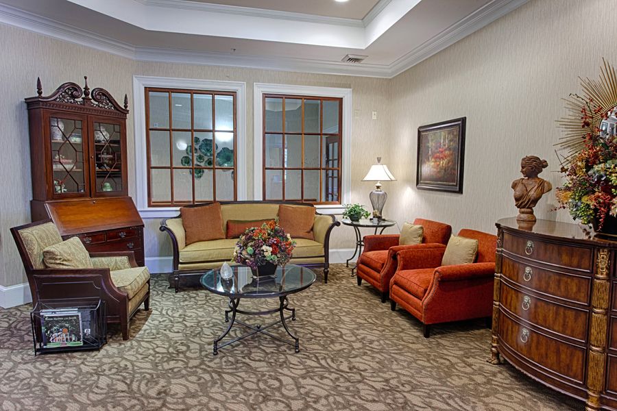 A cozy living room with classic furniture and elegant decor.