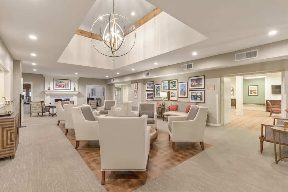 A modern and spacious lobby with comfortable seating and elegant decor.