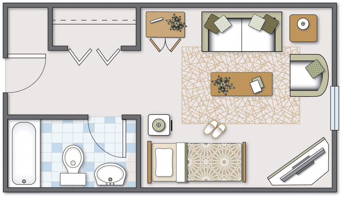 A simple floor plan featuring a bedroom, bathroom, and living room with furniture.