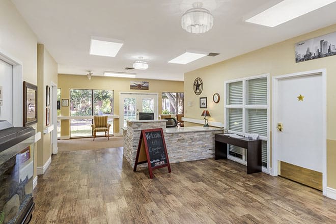 A welcoming reception area with a desk and seating.