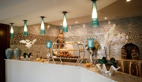 A modern, luxurious interior with elegant lighting and decor elements.
