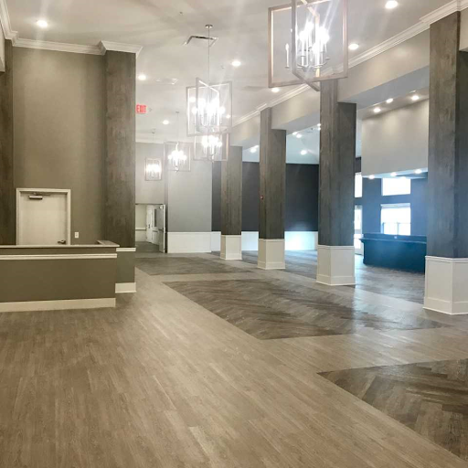 A spacious modern lobby with elegant lighting and contemporary design.