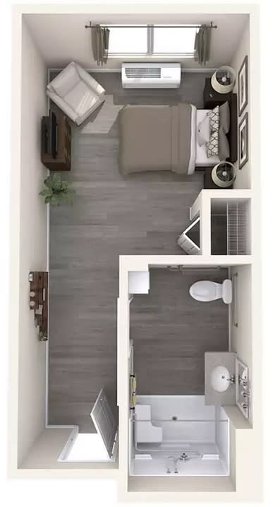 A minimalist studio apartment floor plan with a small bedroom and bathroom area.