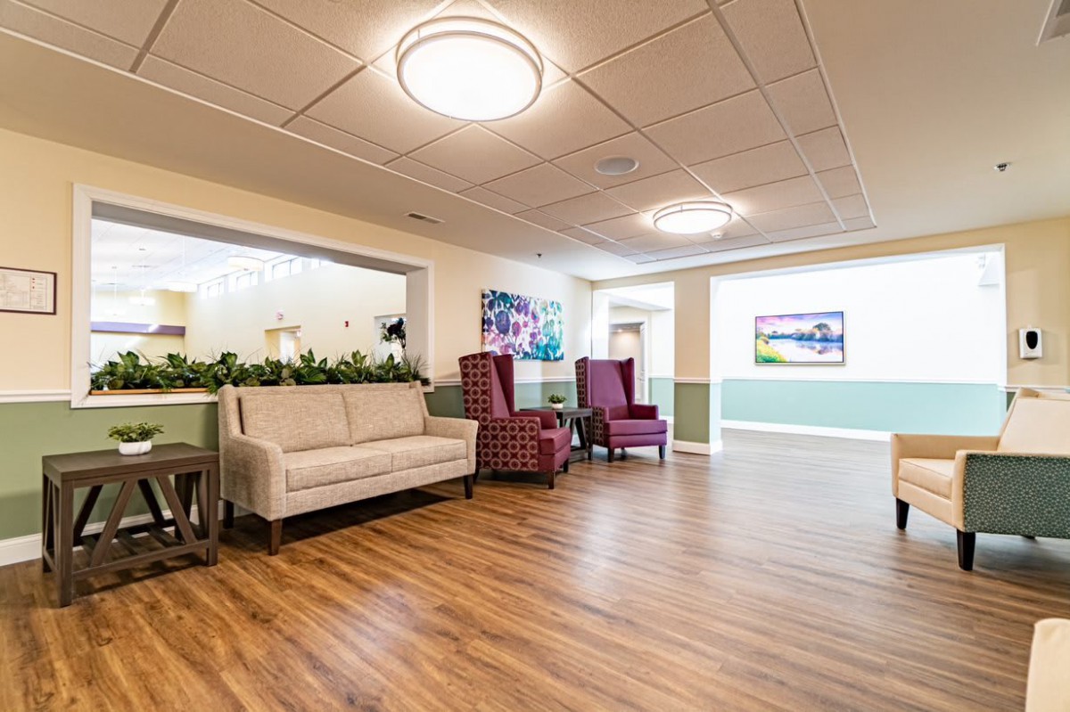 A modern lobby area featuring comfortable seating and ambient lighting.