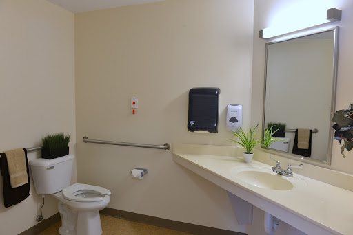 A clean and accessible bathroom with essential amenities.