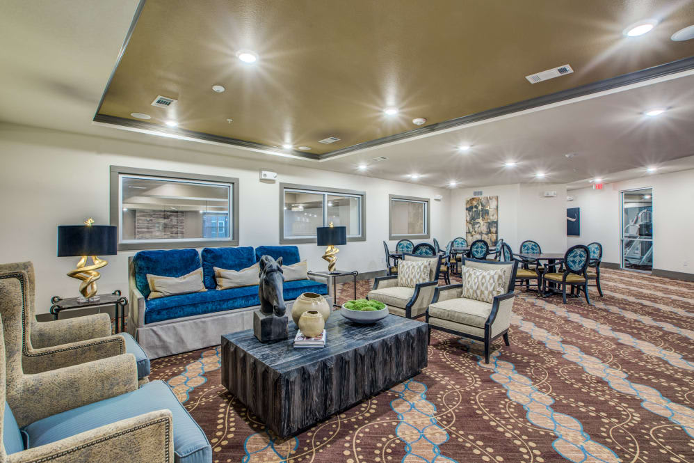 A spacious and elegantly designed living room with comfortable seating and modern decor.
