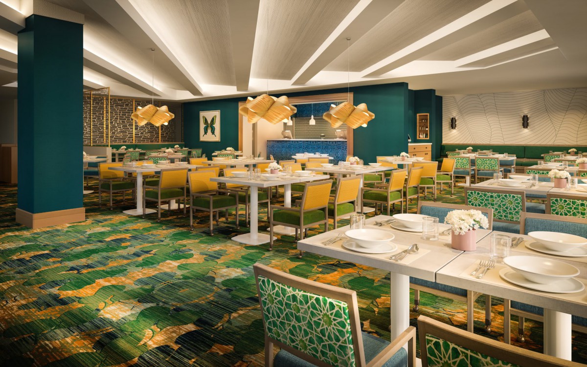 A modern restaurant interior with colorful decor and stylish lighting.