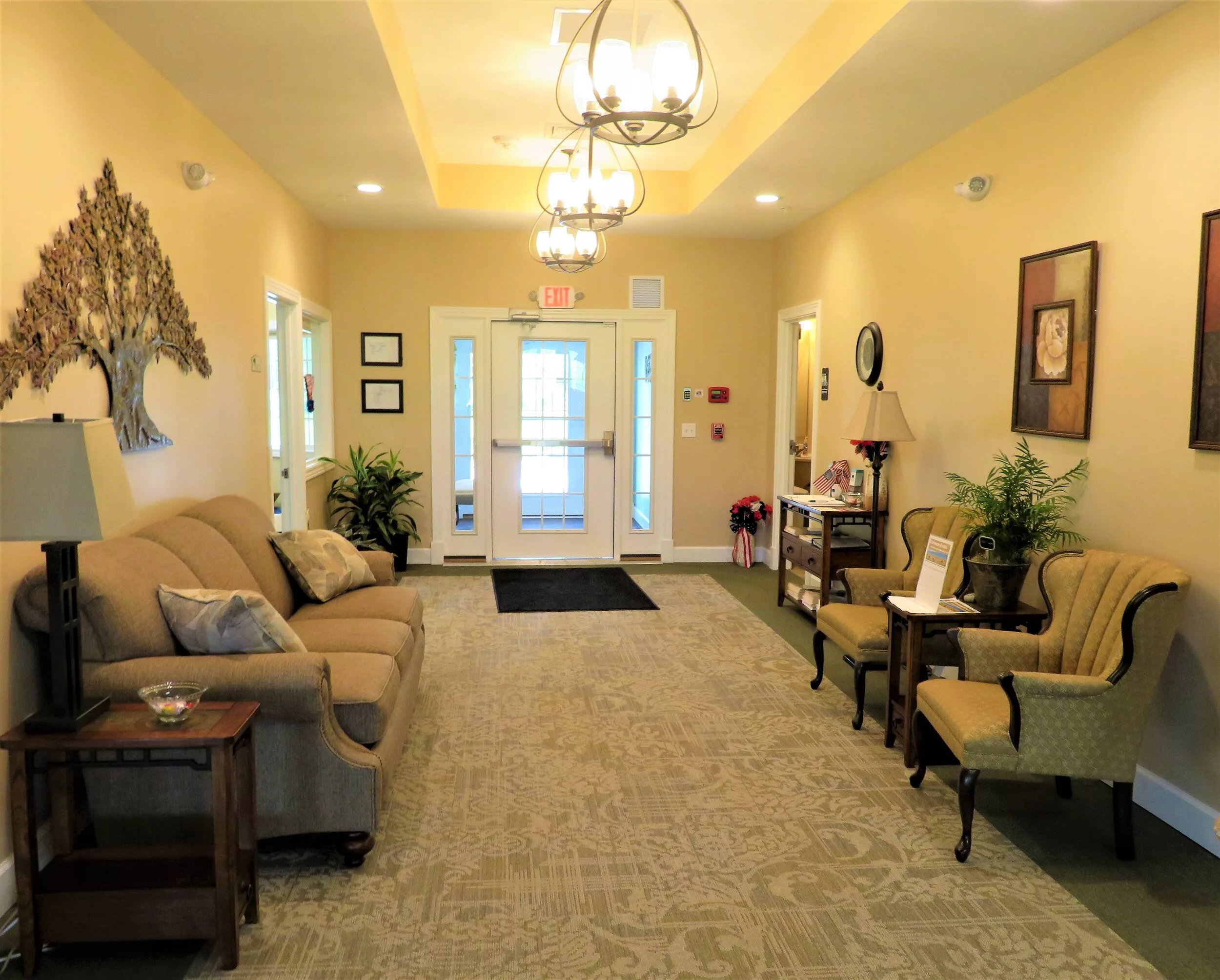 A cozy lobby area with comfortable seating and elegant decor.