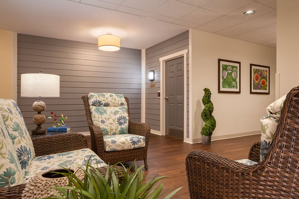A cozy living room with stylish furniture and decorative elements.