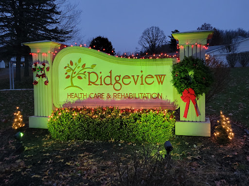 The festive sign of Ridgeview Restaurant & Event Venue, beautifully illuminated for the holiday season.