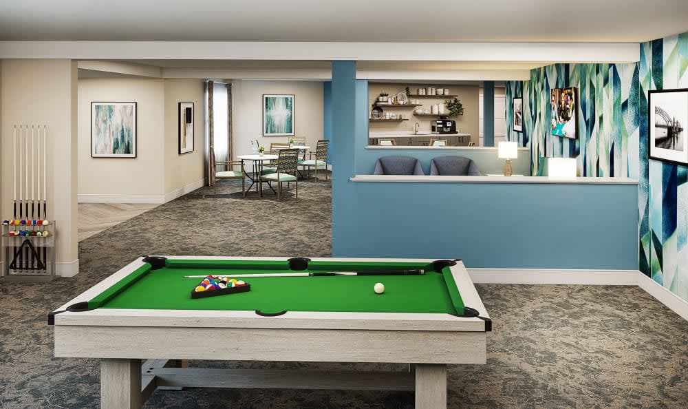 A modern game room featuring a pool table and stylish decor.
