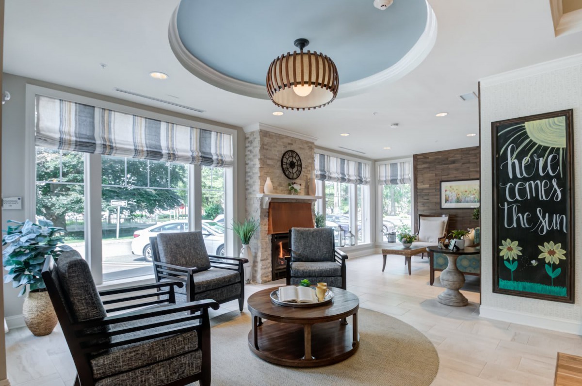 A cozy living room with ample seating and natural light.