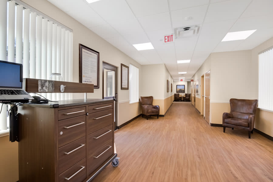 A clean and well-lit hallway in a medical facility.