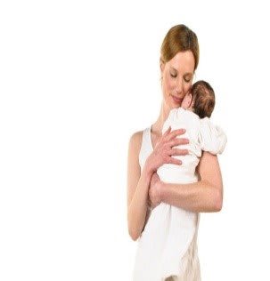 A mother lovingly holding her baby.