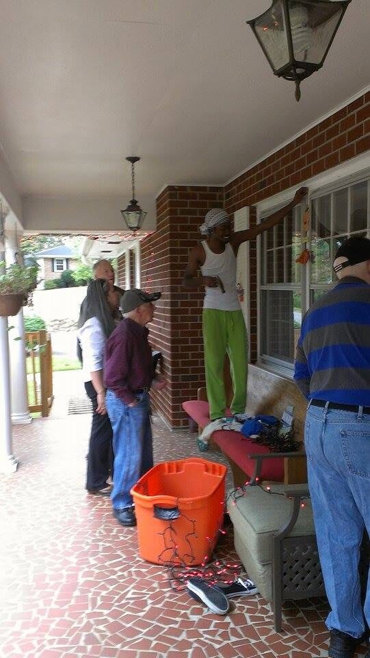 A group of people working together on a home improvement project.