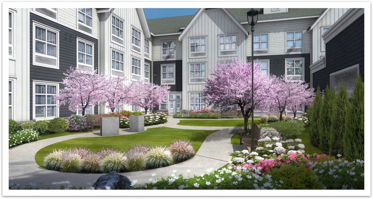 A beautifully landscaped courtyard with blooming trees and flowers.