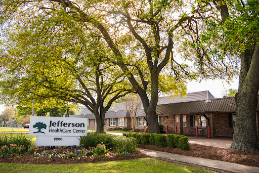 Jefferson Healthcare Center, surrounded by lush greenery.