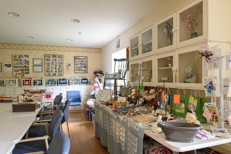 A cozy interior of a vintage shop showcasing an array of antiques and decorative items.
