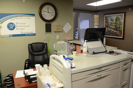 A view of an office reception area with a desk, clock, and seating.