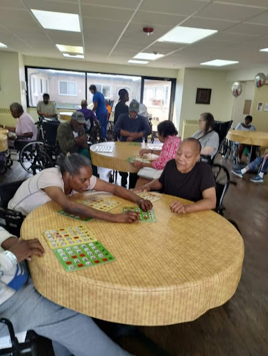 Residents enjoy a lively game of bingo at the senior center, fostering community and connection.