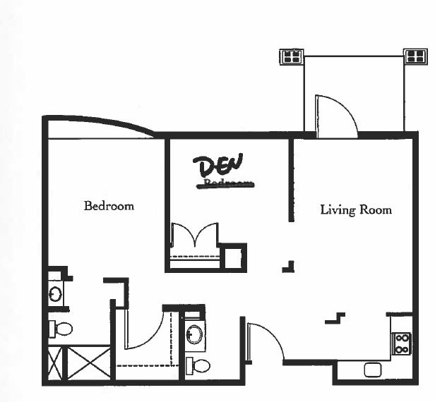 A floor plan showing an apartment layout with a bedroom, living room, and bathroom.