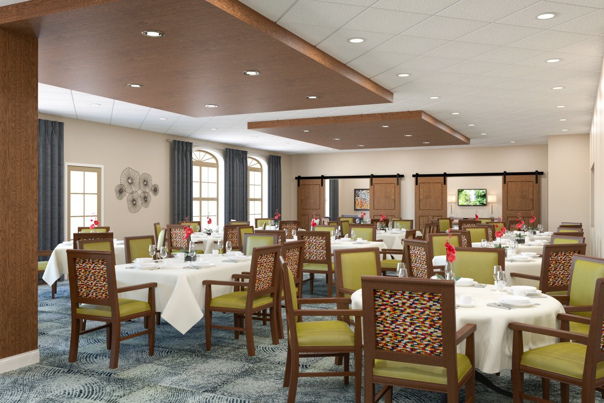 A spacious and elegantly designed dining room with neatly arranged tables and chairs.