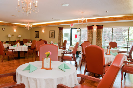 An elegant dining space featuring comfortable seating and tasteful decor.