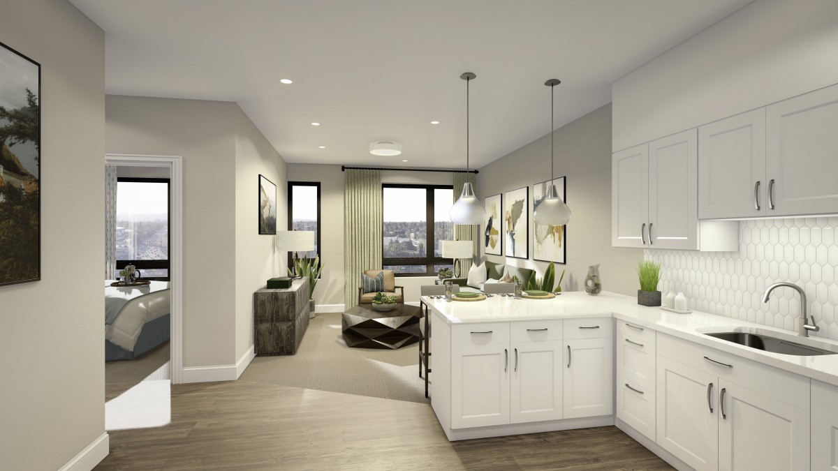 Modern open-concept kitchen and living room with white cabinetry and pendant lighting.