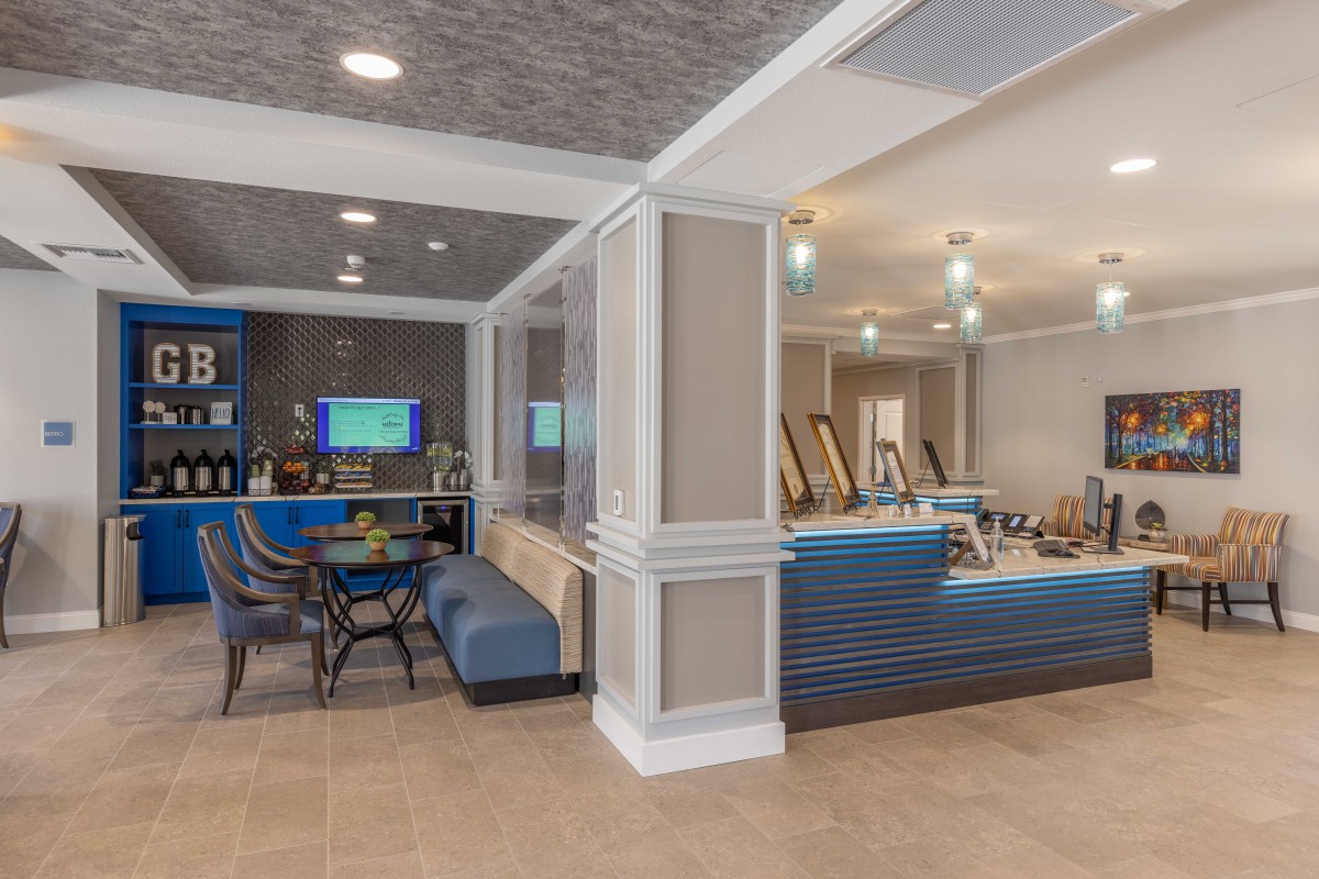 A modern lobby interior featuring comfortable seating and contemporary decor.