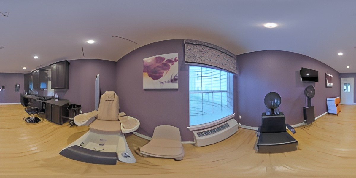 A serene spa room featuring a massage chair and calming purple walls.