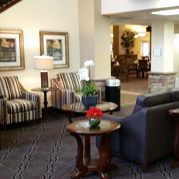 A comfortable lobby area with stylish furniture and elegant decor.