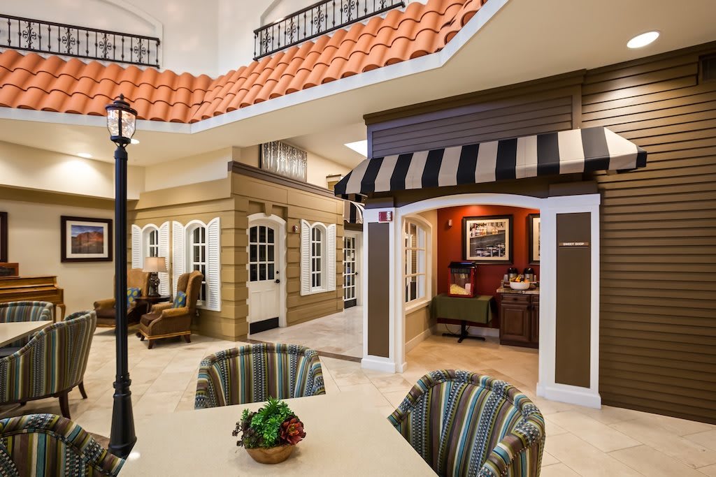 Cozy indoor space with building facades and comfortable seating.