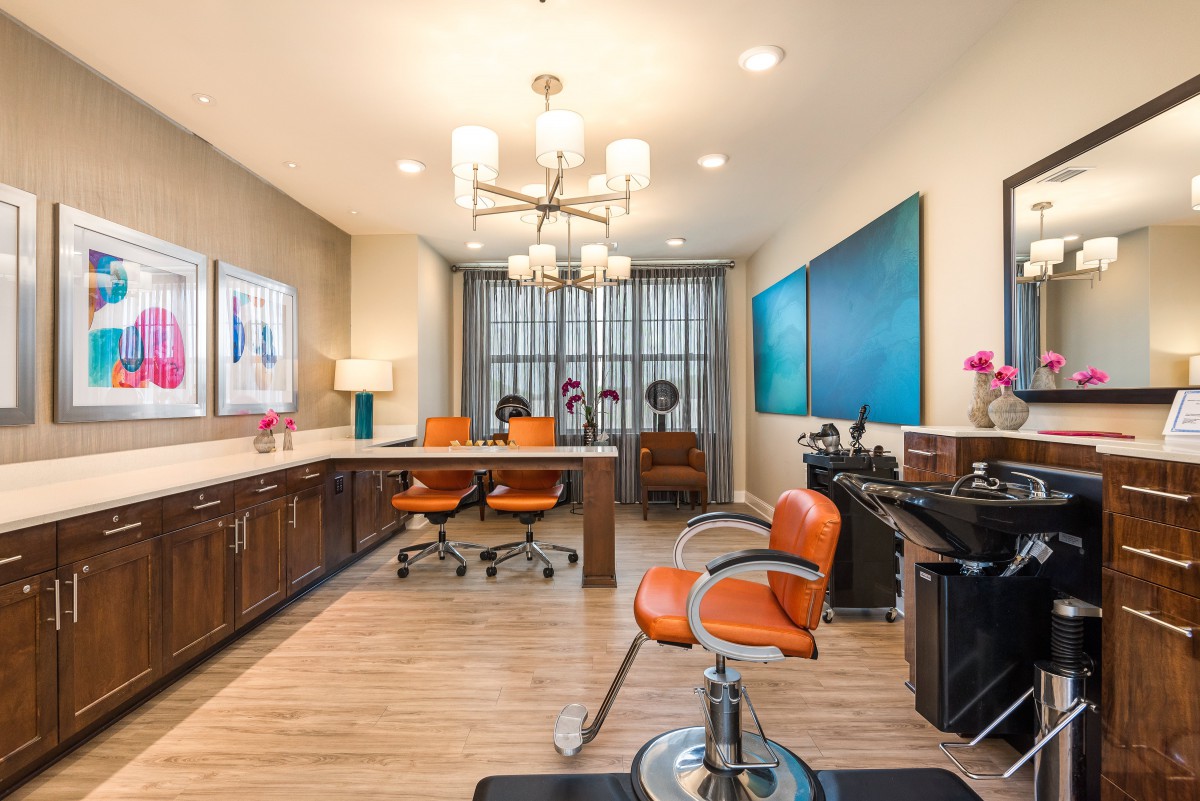 A modern office interior featuring sleek furniture and contemporary art.