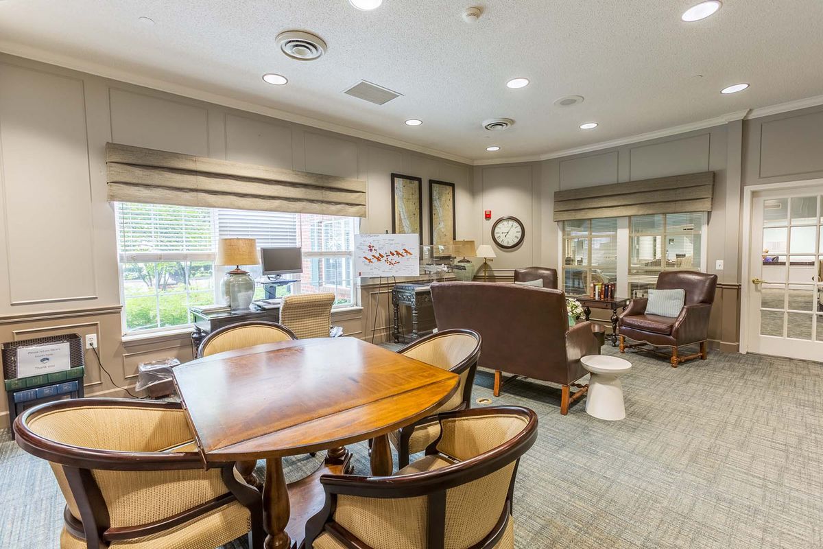 A cozy living room with comfortable seating and elegant decor.