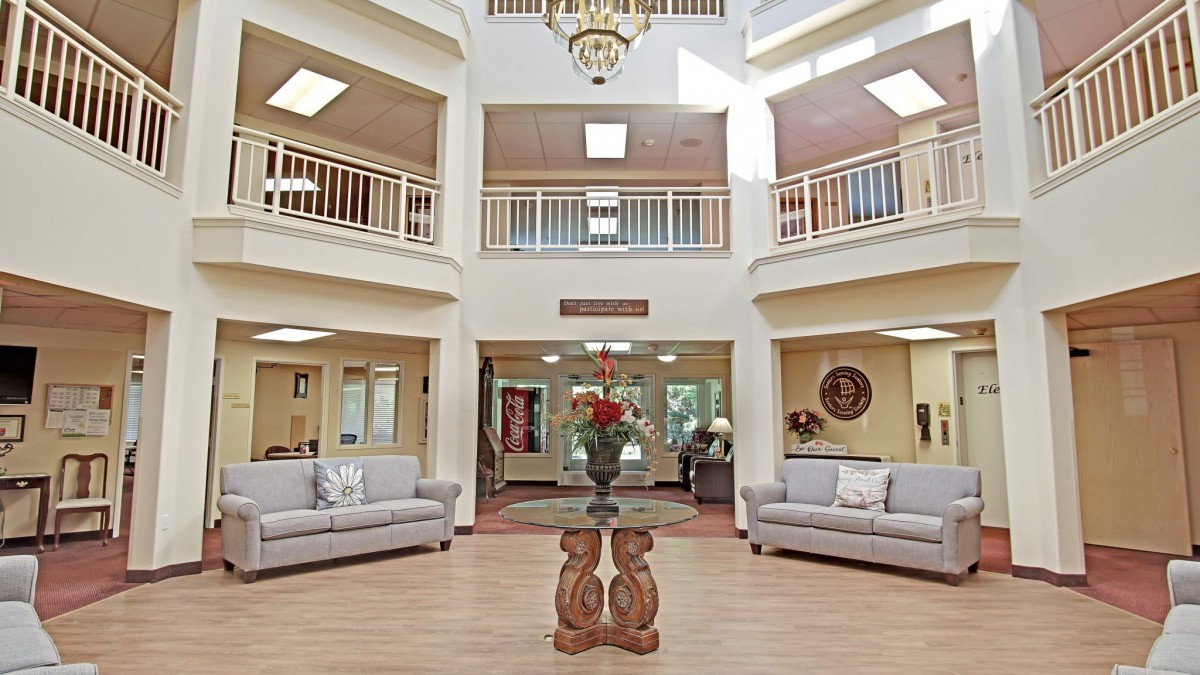 Spacious lobby area with elegant decor and comfortable seating.