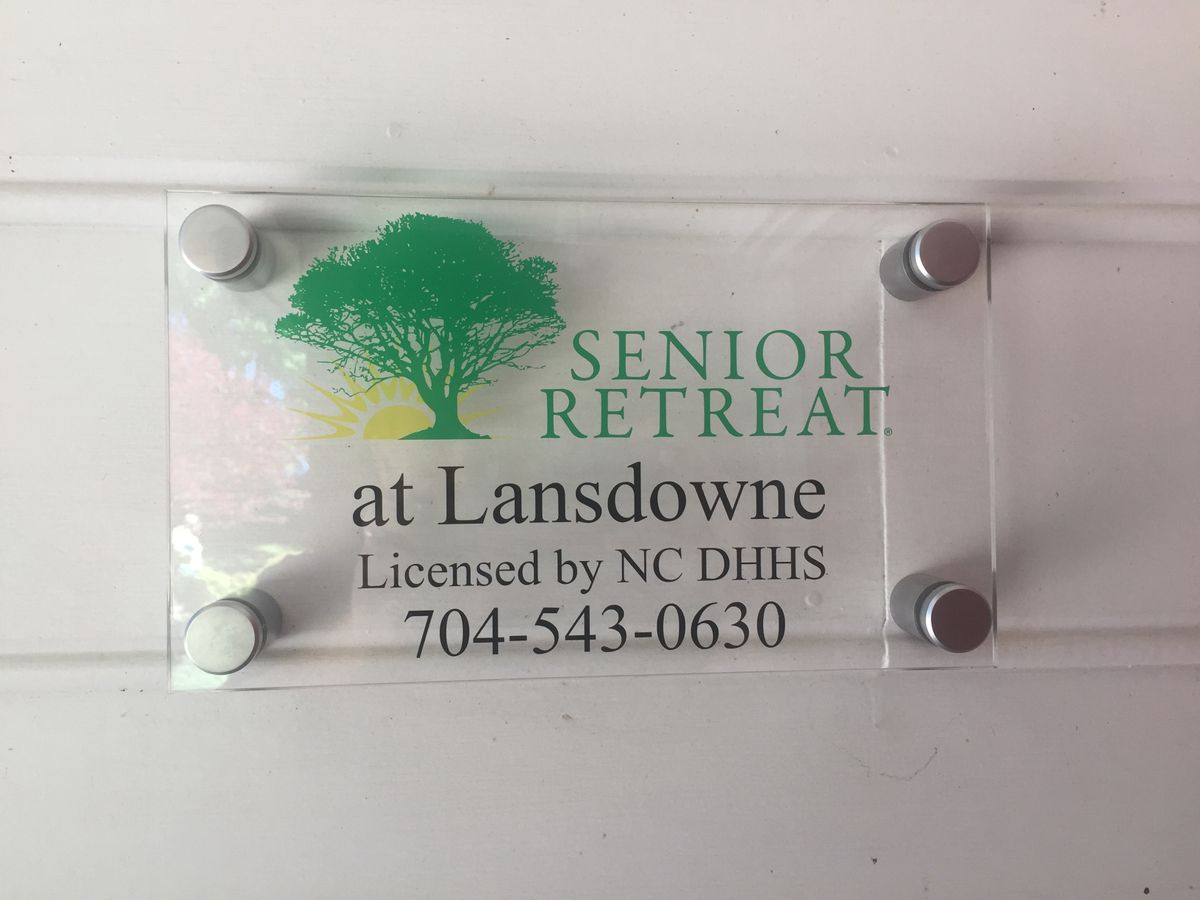 Sign for Senior Retreat at Lansdowne with contact details.