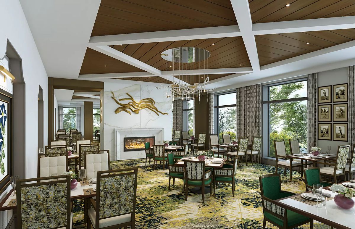 A modern restaurant dining area featuring elegant chandeliers, a cozy fireplace, and stylish furnishings.