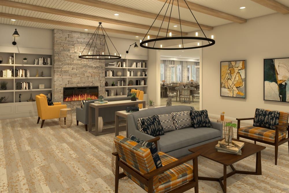 A modern living room with a cozy fireplace, stylish lighting fixtures, and comfortable seating.