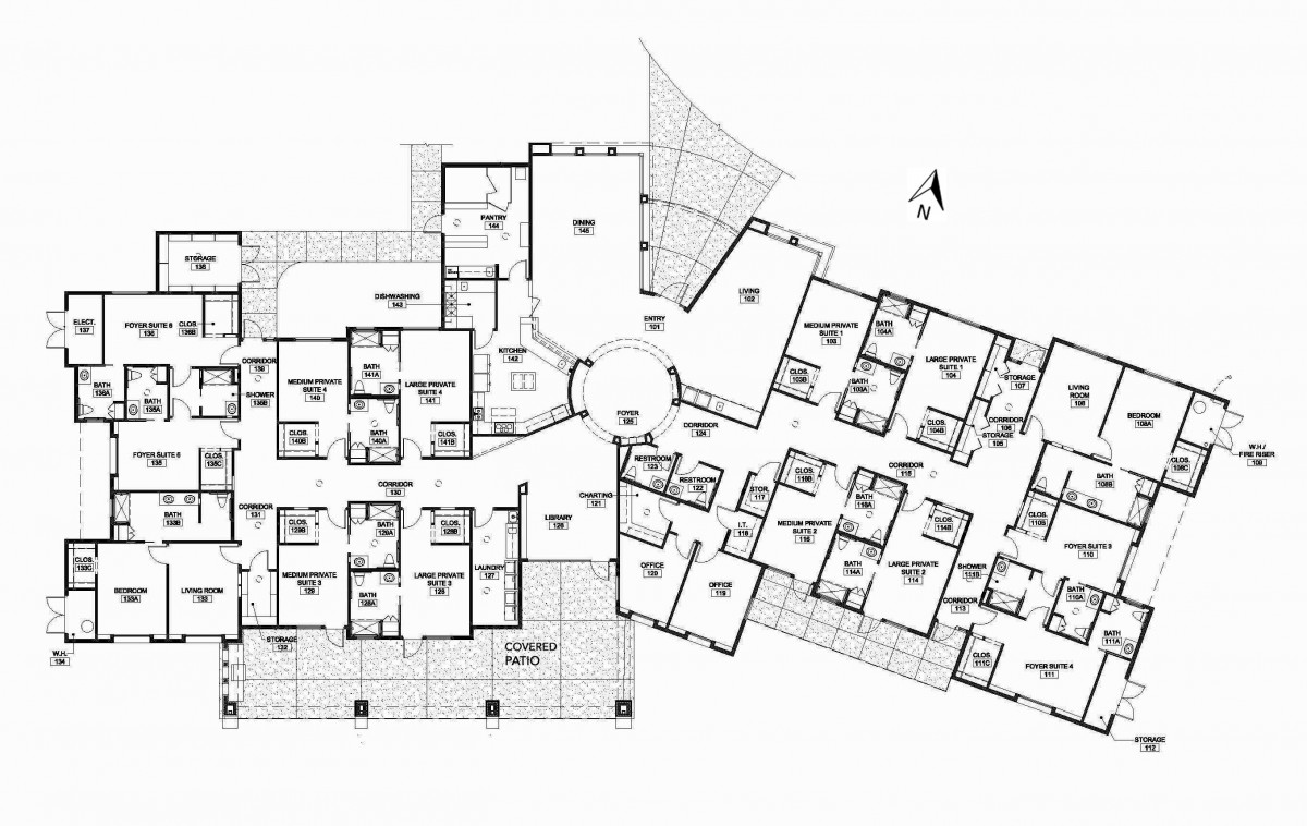 An architectural floor plan illustrating the layout of a building with multiple rooms and apartments.