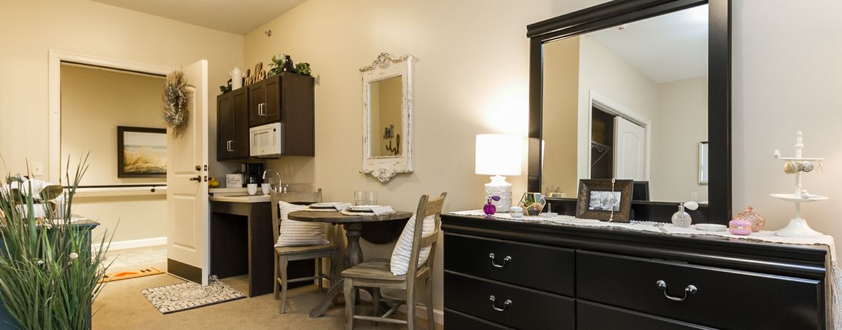 Cozy dining and kitchenette area with elegant furnishings.