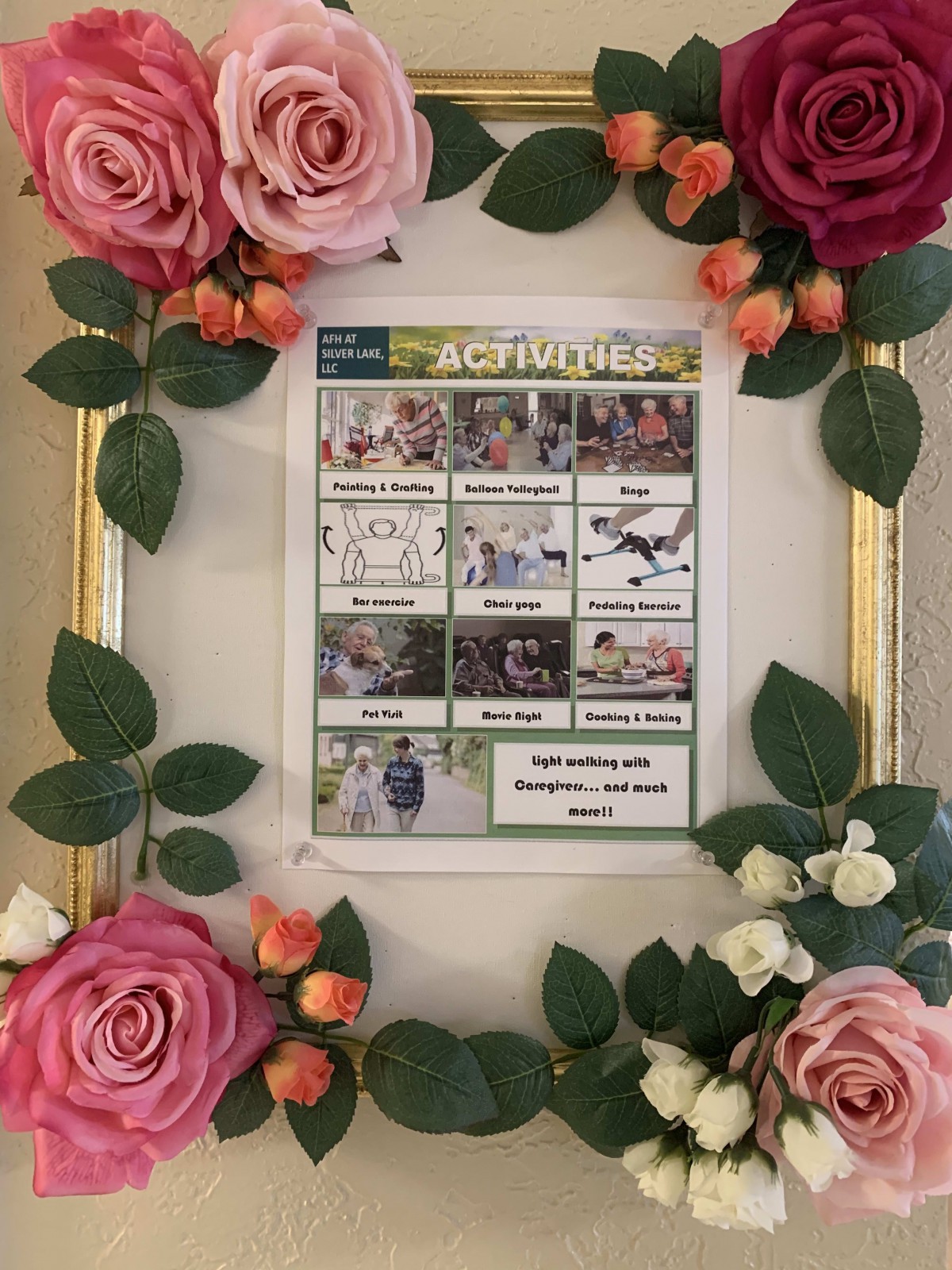 A beautifully framed activity schedule adorned with vibrant flowers.