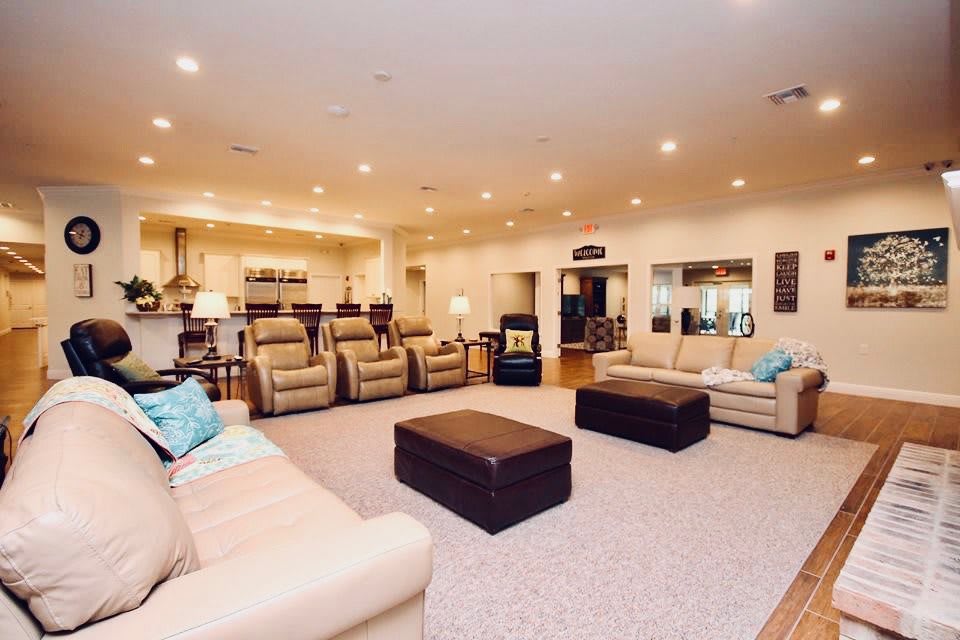 Spacious living room with comfortable seating and modern decor.