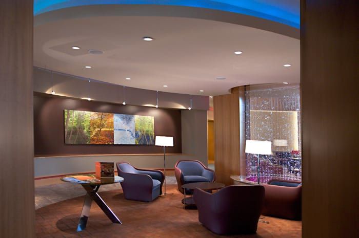 A modern lobby with comfortable seating and artistic decor.