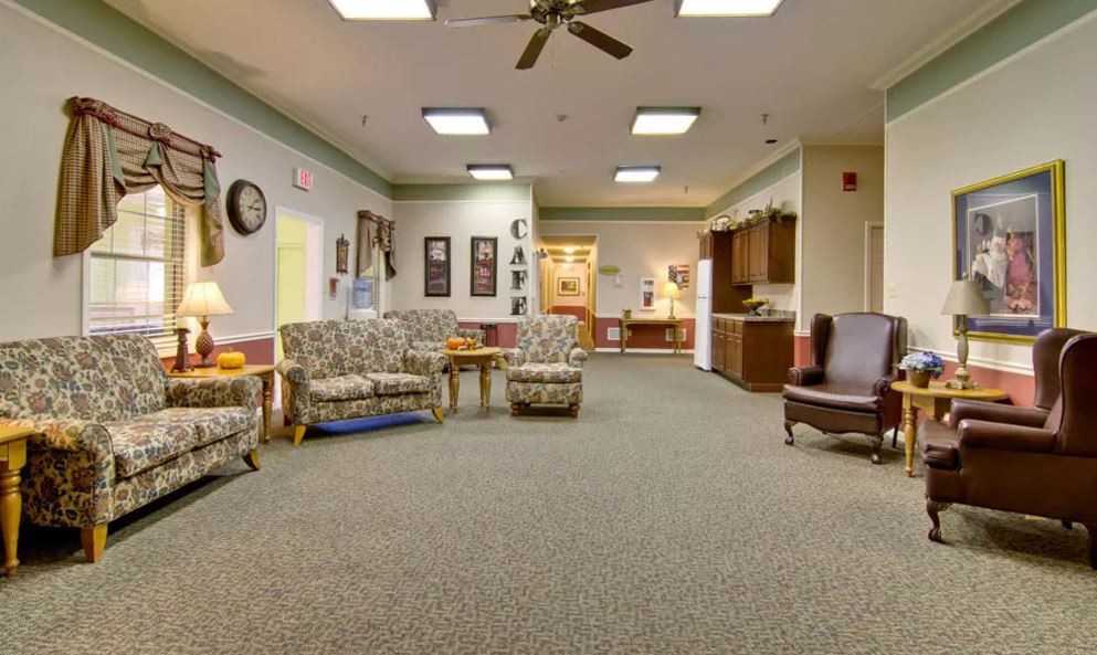 A cozy waiting area with comfortable seating and warm lighting.