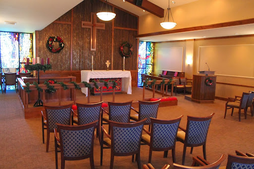 A serene interior of a church, designed for worship and community gatherings.