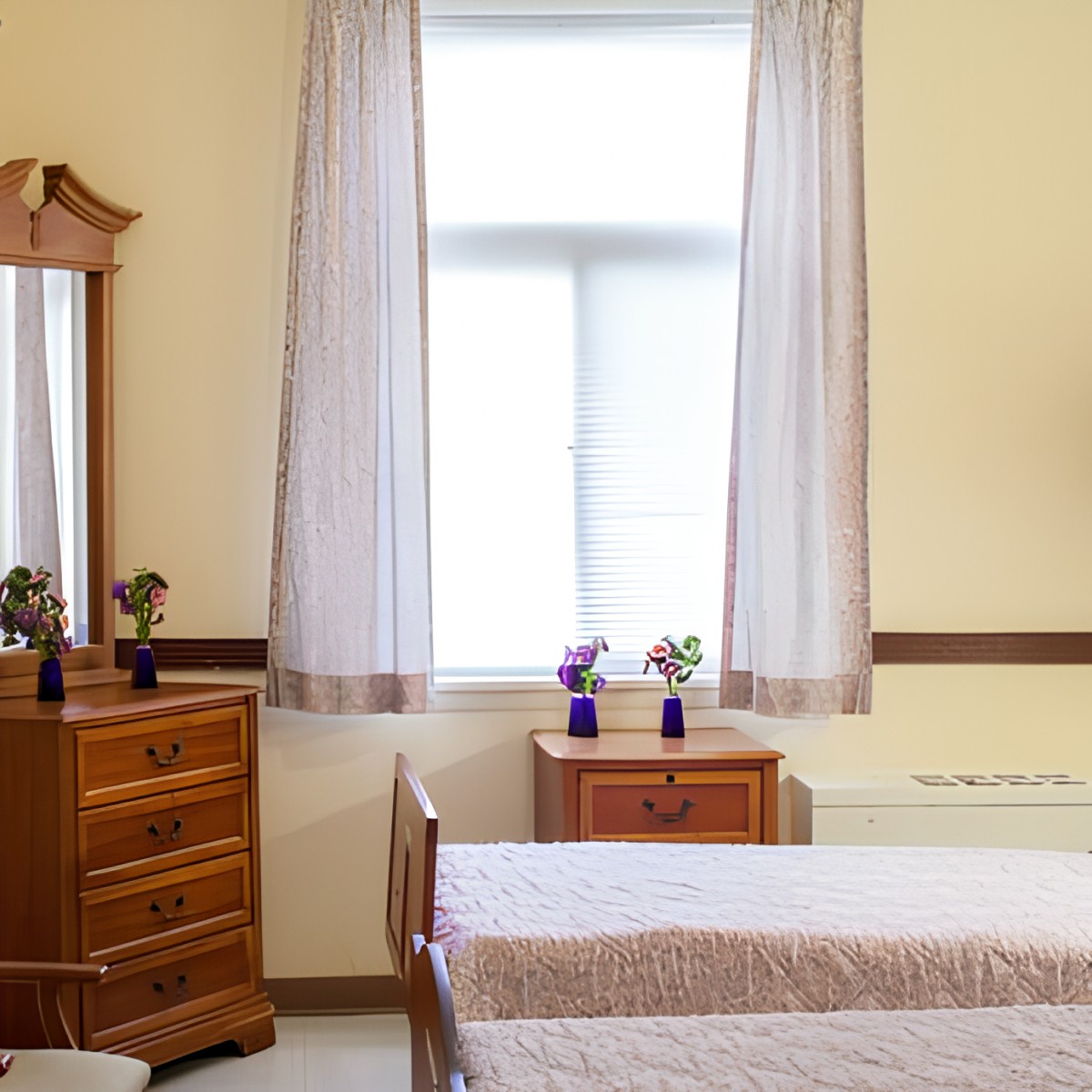A cozy bedroom featuring wooden furniture and soft lighting.