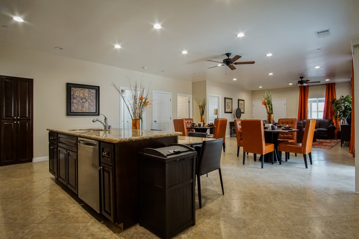 A modern open-concept kitchen and dining area with contemporary furnishings.